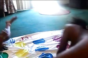 Enjoy watching in nature's garb ebony angels playing twister indoors