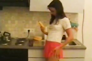 Perverted slim dark brown plays her impure games with banana