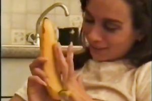 Perverted slim dark brown plays her impure games with banana