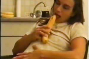 Perverted slim dark brown plays her impure games with banana