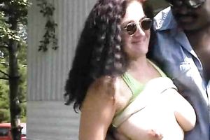 Mature brunette milfie slutty wife shows her billibongs to all slutty men