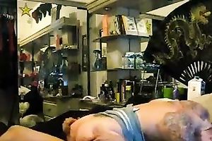 Slutty large bottomed floozy is drilled by her tattooed guy on cam