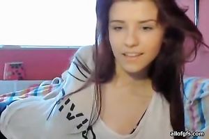 Amazingly beautiful redhead likes stripping in front of her livecam
