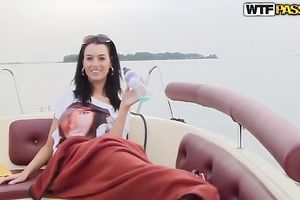 Busty dark haired wench acquires cunnilingus from her guy on the boat