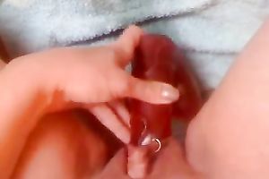 Poking my pierced hairless vagina with a dildo on web camera