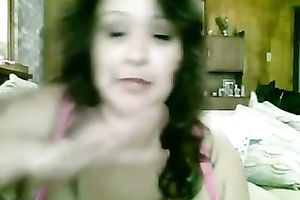 Tattooed bosomy brunette hair smiles during the time that masturbating