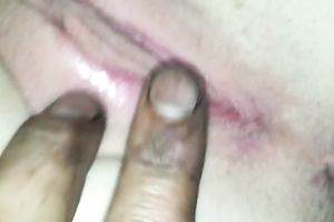 Closeup view of precious pink love tunnel and large penis penetration in it