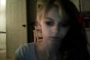 Blonde legal age teenager with flat titties widens her legs wide apart masturbating on livecam