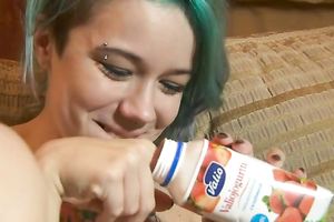 Skinny tattooed pale skin teenie poses topless on the ottoman