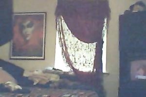 Chubby aged golden-haired housewife after shower stripped in the bedroom