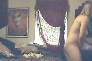 Chubby aged golden-haired housewife after shower stripped in the bedroom