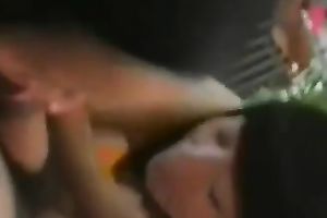 Two dilettante Chinese dark haired ladies work on strong 10-Pounder (FFM)