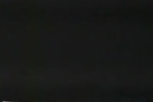 Mesmerizing and cute dark brown chick on the bed in front of livecam