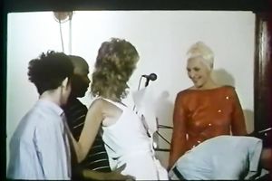 Two blondies get shared betwixt studs in the music studio