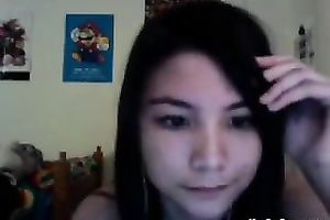 Nude web camera sweetheart talking on the prone and touching her snatch