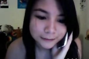 Nude web camera sweetheart talking on the prone and touching her snatch