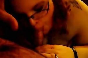 Fat and cute lady in glasses enjoying a spicy 10-Pounder