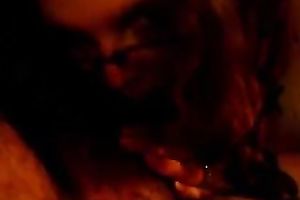 Fat and cute lady in glasses enjoying a spicy 10-Pounder