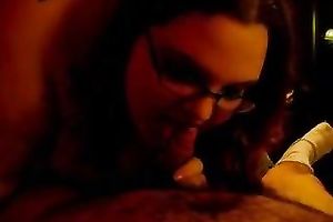 Fat and cute lady in glasses enjoying a spicy 10-Pounder