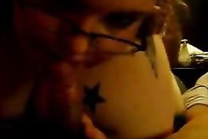 Fat and cute lady in glasses enjoying a spicy 10-Pounder