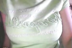 horny web camera bitch pulled up her green T-shirt to show off her big boobies