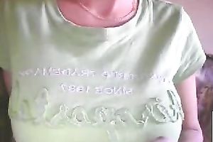 horny web camera bitch pulled up her green T-shirt to show off her big boobies
