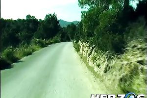 Dirty golden-haired bitch and a pair of hippie men in outdoor threesome