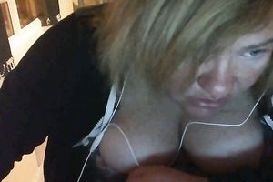 Ugly large boobed doxy showing her bust on cam session