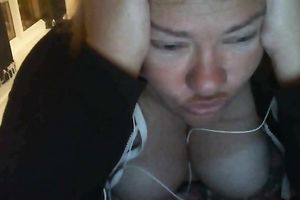 Ugly large boobed doxy showing her bust on cam session