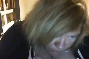Ugly large boobed doxy showing her bust on cam session