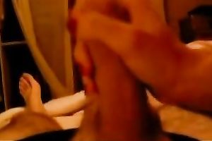 My flamboyant sweetie strokes my hard dong with her hands