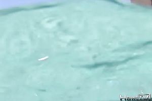 Stunning golddigging dark brown bimbo naked in the pool