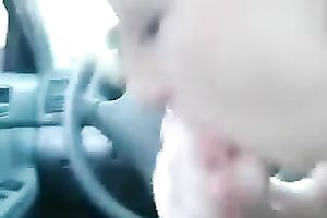 Blonde legal age teenager engulfing my penis in a car in the afternoon