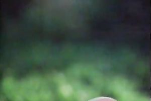 Beautiful light haired white lady has oral job petting outdoors