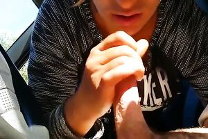 Dirty prostitute engulfing large penis in a car for specie