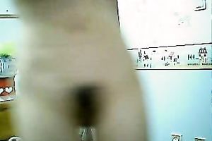 Pretty wonderful natural Asian brunette gets busy with fingering her pleasant snatch