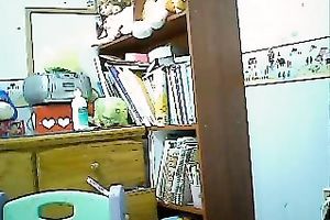 Pretty wonderful natural Asian brunette gets busy with fingering her pleasant snatch