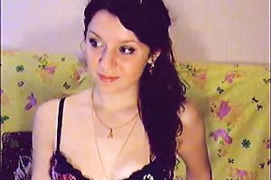 Amateur brunette hair cutie on livecam positions in charming underware