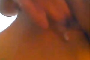 Wondrous large bottomed raven haired beauty masturbates in weird way