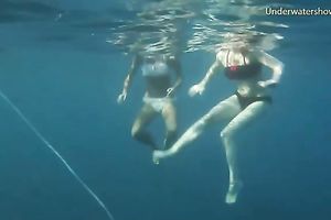Young and exquisite European legal age teenager chicks in the blue unfathomable sea