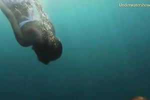 Young and exquisite European legal age teenager chicks in the blue unfathomable sea