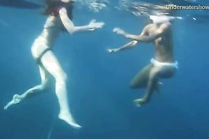 Young and exquisite European legal age teenager chicks in the blue unfathomable sea