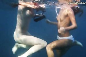 Young and exquisite European legal age teenager chicks in the blue unfathomable sea