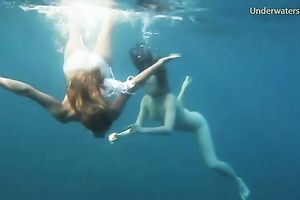 Young and exquisite European legal age teenager chicks in the blue unfathomable sea