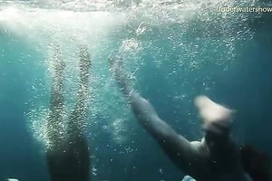 Young and exquisite European legal age teenager chicks in the blue unfathomable sea