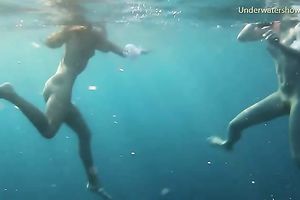 Young and exquisite European legal age teenager chicks in the blue unfathomable sea