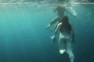 Young and exquisite European legal age teenager chicks in the blue unfathomable sea