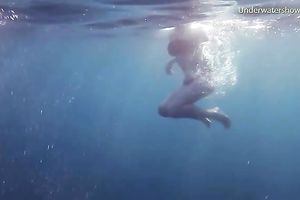 Young and exquisite European legal age teenager chicks in the blue unfathomable sea
