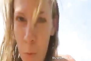 Busty blond sweetheart on the lake in nature's garb gives me head on POV