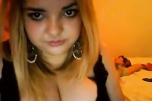 Nice large boobed girlie posing seductively whilst on livecam with me